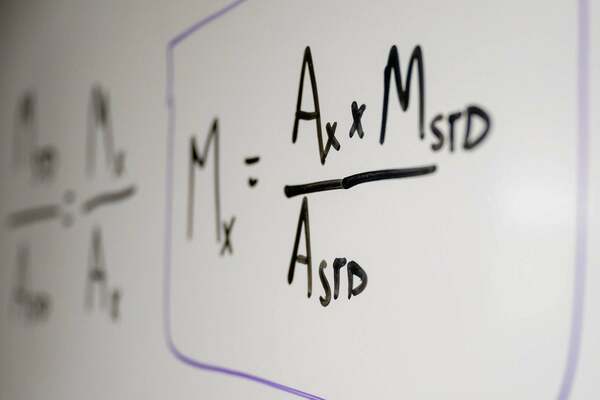  Equations on a white board